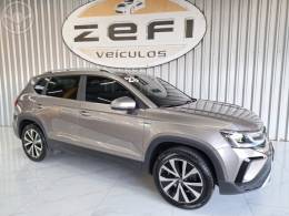 VOLKSWAGEN - TAOS 1.4 16V HIGHLINE TSI FLEX 4P AUTOMÁTICO - 2023/2023 - BEGE - R$ 164.900,00