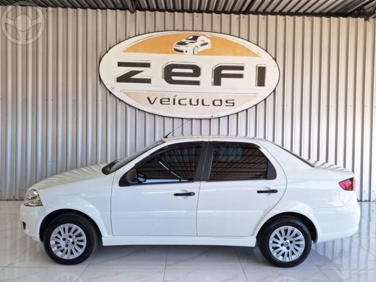 FIAT - SIENA 1.0 MPI EL 8V FLEX 4P MANUAL - 2014/2015 - BRANCA - R$ 31.500,00