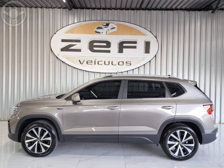 VOLKSWAGEN - TAOS 1.4 16V HIGHLINE TSI FLEX 4P AUTOMÁTICO - 2023/2023 - BEGE - R$ 164.900,00