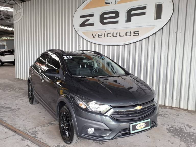 CHEVROLET - ONIX 1.4 MPFI ACTIV 8V FLEX 4P AUTOMÁTICO - 2019/2019 - CINZA - R$ 74.900,00