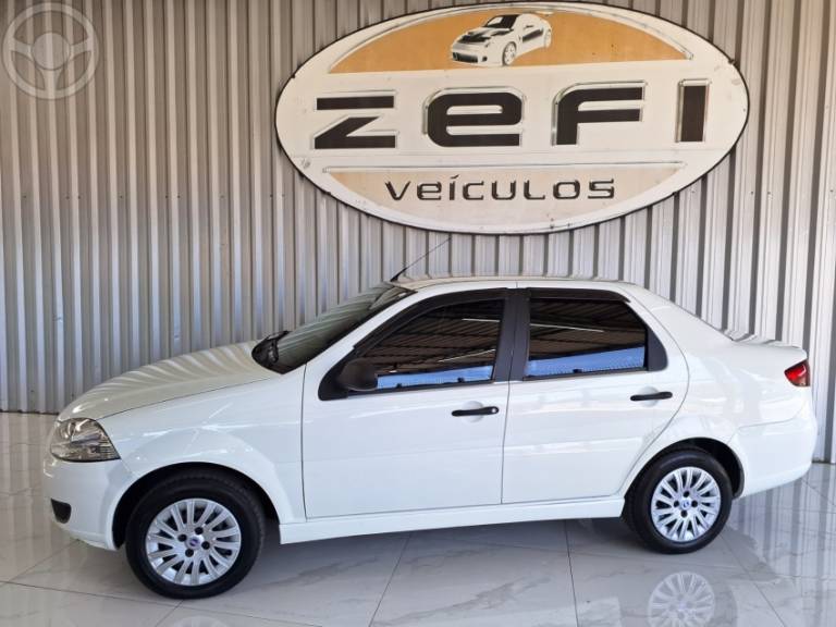 FIAT - SIENA 1.0 MPI EL 8V FLEX 4P MANUAL - 2014/2015 - BRANCA - R$ 31.500,00
