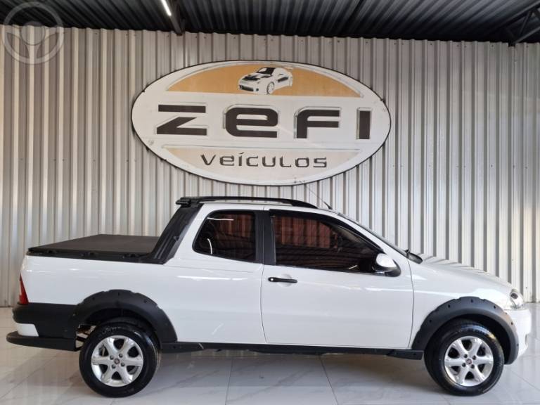 FIAT - STRADA 1.6 MPI TREKKING CD 16V 2P MANUAL - 2012/2013 - BRANCA - R$ 55.900,00