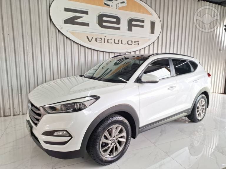HYUNDAI - TUCSON 1.6 16V T-GDI GLS ECOSHIFT - 2017/2018 - BRANCA - R$ 99.900,00