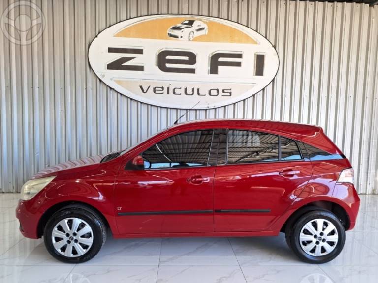 CHEVROLET - AGILE 1.4 MPFI LT 8V FLEX 4P MANUAL - 2011/2011 - VERMELHA - R$ 28.500,00