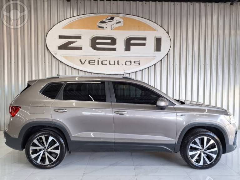 VOLKSWAGEN - TAOS 1.4 16V HIGHLINE TSI FLEX 4P AUTOMÁTICO - 2023/2023 - BEGE - R$ 164.900,00