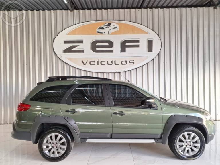 FIAT - PALIO 1.8 MPI ADVENTURE WEEKEND 16V FLEX 4P MANUAL - 2014/2015 - VERDE - R$ 49.900,00