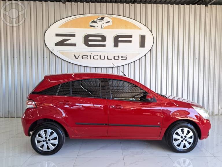 CHEVROLET - AGILE 1.4 MPFI LT 8V FLEX 4P MANUAL - 2011/2011 - VERMELHA - R$ 28.500,00