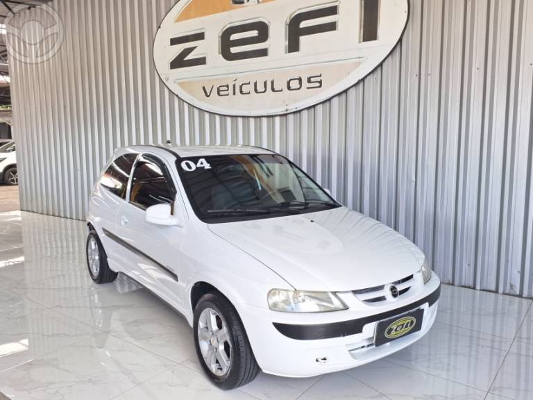 CHEVROLET - CELTA 1.0 MPFI VHC SUPER 8V 2P MANUAL - 2003/2004 - BRANCA - R$ 16.500,00